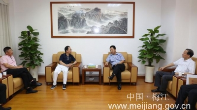 区委书记朱国城会见香港高迪集团董事长陈竹均一行