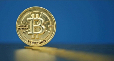 比特币价格涨破1万美元  业内忧心“泡沫”