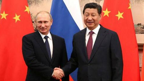 习近平和普京互致新年贺电，愿继续巩固中俄政治和战略互信