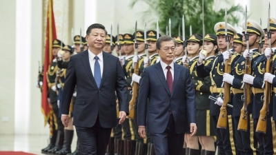 习近平同韩国总统文在寅举行会谈：确保中韩关系行稳致远