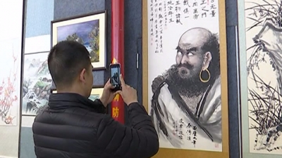 迎新春书画摄影作品联展在平远县文化馆展出