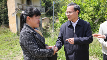 全国人大代表彭唱英返梅后立即投入工作  将全国两会精神传达到基层