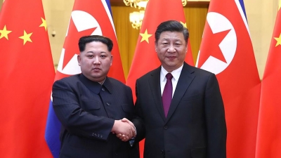 习近平同金正恩举行会谈