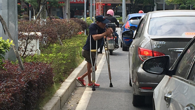 时评丨制止红绿灯路口乞讨有法可依