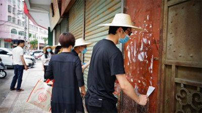 梅江区司法局组织党员志愿者到帮扶街道开展清洁服务活动