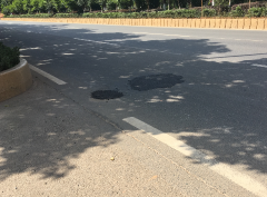 路中大坑已修复  城西收费站出口路面恢复平整