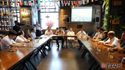 钟光灵拜访上海客家联谊会：汇聚乡贤智慧 共谋梅县发展