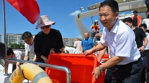 梅江区开展增殖放流活动，33万尾鱼苗投放梅江河