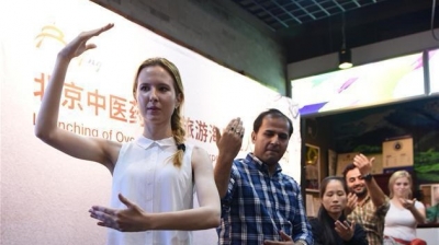 十一出境游火爆，他们却来中国寻找“诗和远方”