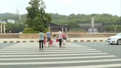 梅县区“创文”入人心 文明出行成一条靓丽风景线