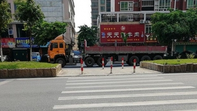 梅城这段“夺命路”设置了临时红绿灯，为何市民还抱怨？