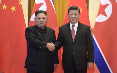 习近平同朝鲜劳动党委员长金正恩举行会谈
