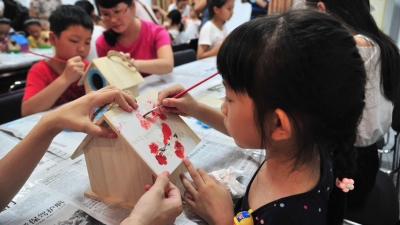 小鸟有了酷炫的新家！今天，梅江区萌娃家长齐动手为创森代言 