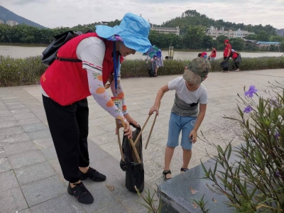 “河”你一起行动！“民间河长”携手志愿者助力创森，扮靓梅江河