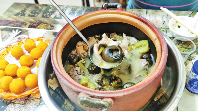 寻访民间客家菜名品丨来嘬螺了喂...这个畲江田螺煲包你食顶愿！