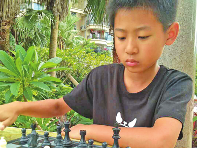 太厉害了！兴宁这名小学生晋升“棋协大师”，系梅州市年龄最小！
