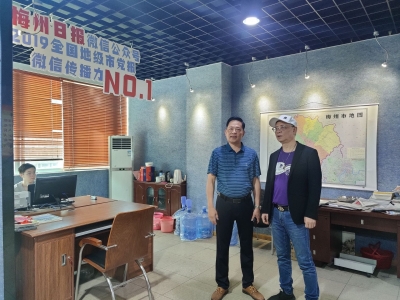 著名音乐人陈洁明到梅州日报社进行参观交流