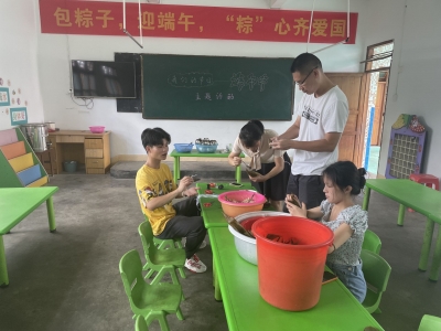 今天，梅县区石坑镇中心小学学生收获的不仅有粽子，还有...