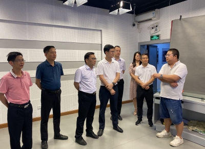 梅州市体育局一行到梅州日报社考察交流