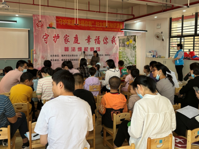 梅江区西郊街道举办妇女维权法制宣传暨图书捐赠活动