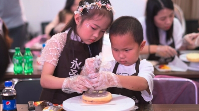 梅江区开展“双拥亲子行·情暖母亲节”双拥主题活动