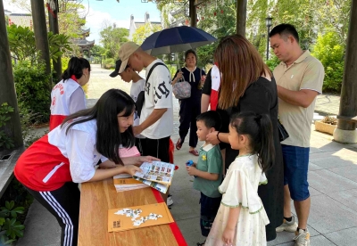 梅县区开展暑期文明旅游志愿服务宣传活动