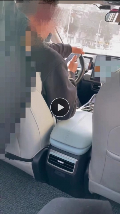 网约车司机开车刷抖音，后排乘客心惊惊