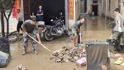 大埔县人武部组织民兵力量，助力灾后重建