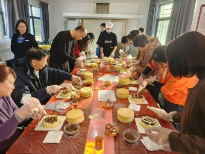 梅江区金山街道联合区侨联开展“‘侨’手做烘焙 糕香暖冬至”活动