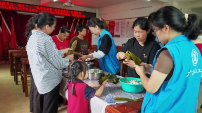 梅江区西阳镇直坑村举办“粽香连邻里 佳节话民俗”主题活动