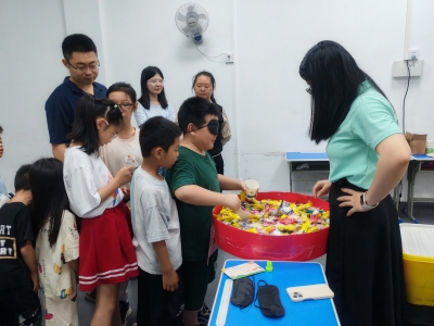 梅江区三角镇同心社区举办“欢度六一·时光童享”亲子嘉年华活动