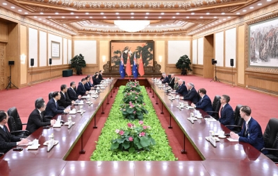 习近平会见新西兰总理拉克森