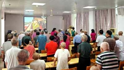 大埔县福利院组织院内长者和职工观看九三阅兵直播