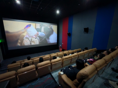 梅州举行《遥远的普若岗日》媒体观影活动